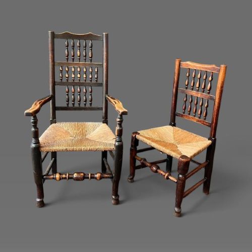 A set of ten dark oak Victorian Lancashire dining chairs with tiered spindle backrests and hand-woven rush seats. View IV
