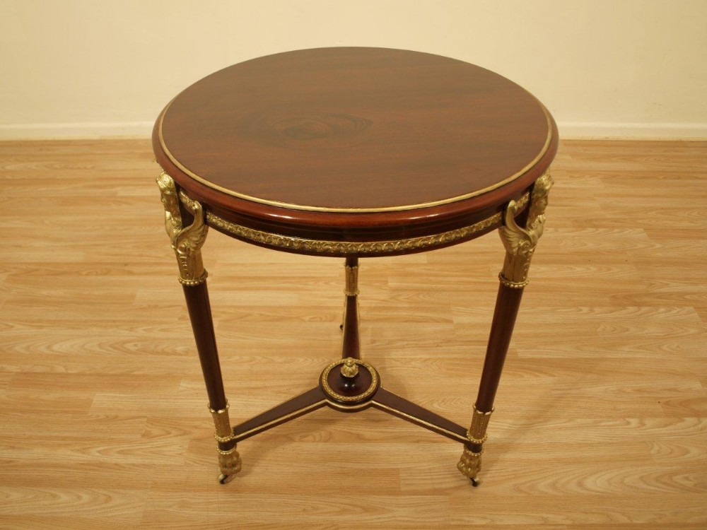 A Mahogany French Empire Style Circular Occasional Table