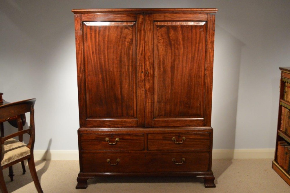A Wonderful Cuban Mahogany George III Period Low Linen Press