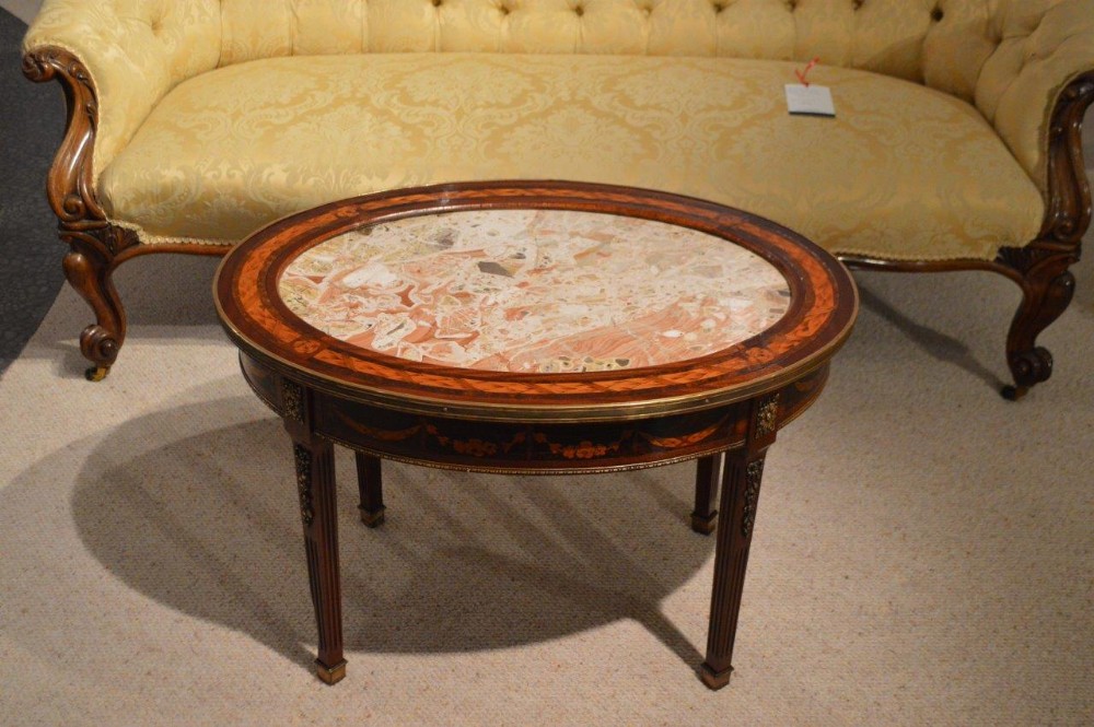 A Mahogany Marble Topped Oval Antique Coffee Table