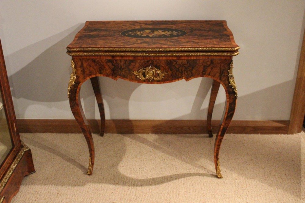 A Burr Walnut, Tulipwood & Marquetry Inlaid Victorian Period Games Table