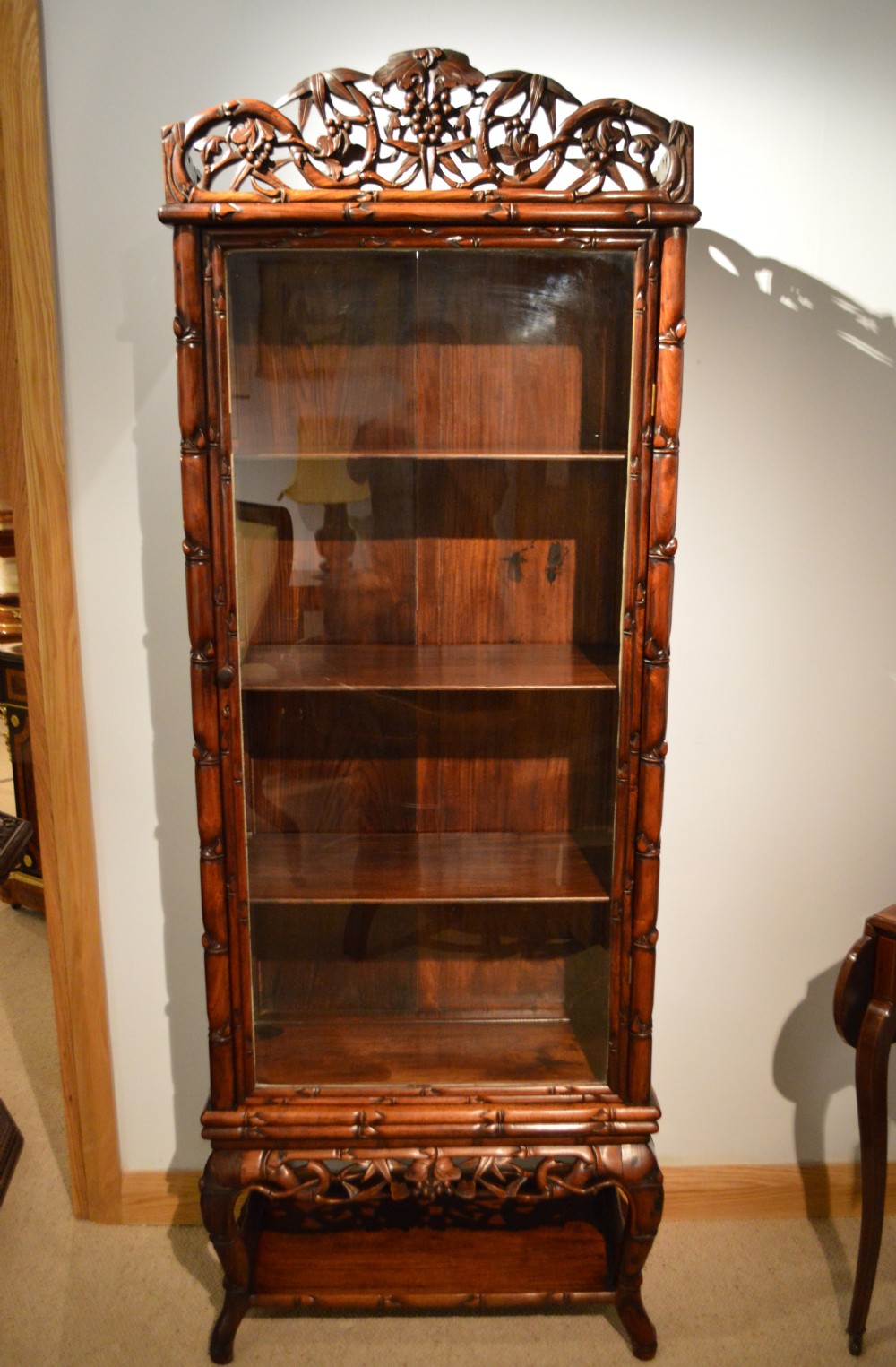 A Chinese Late 19th Century Hardwood Display Cabinet