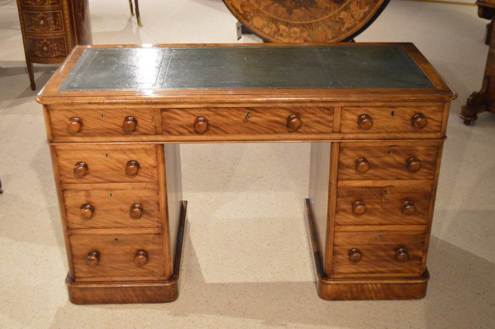 A Walnut Victorian Period Antique Pedestal Desk