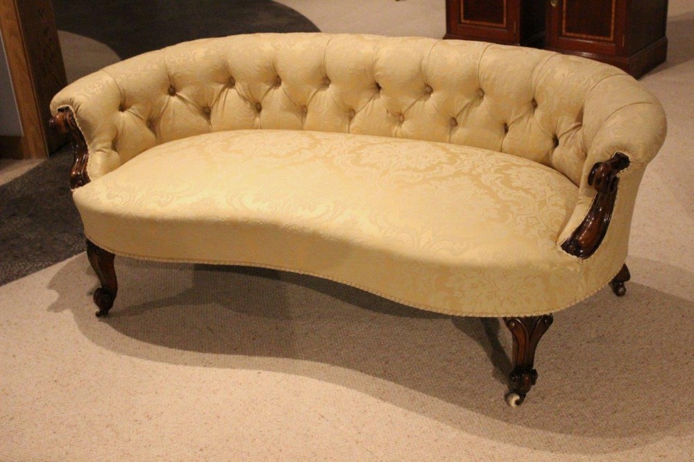 A Small Walnut Victorian Period Curved Settee
