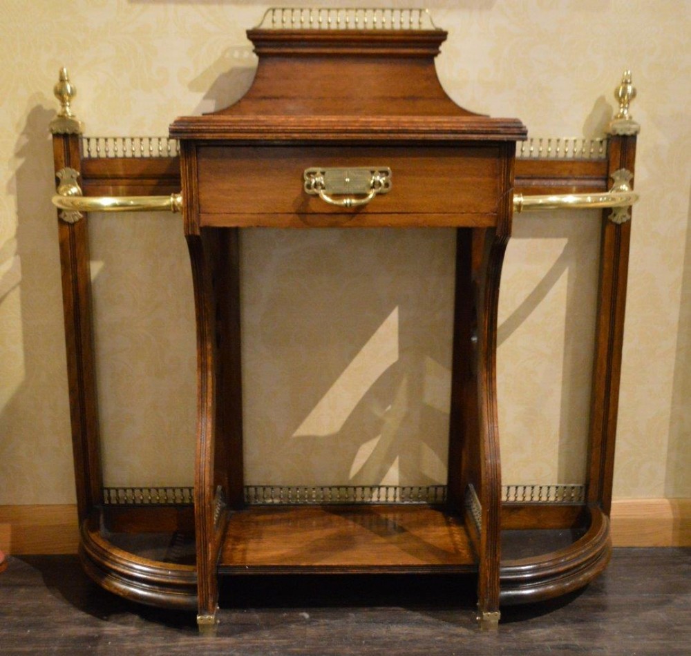 An Oak & Brass Late Victorian Period Stick Stand By James Shoolbred