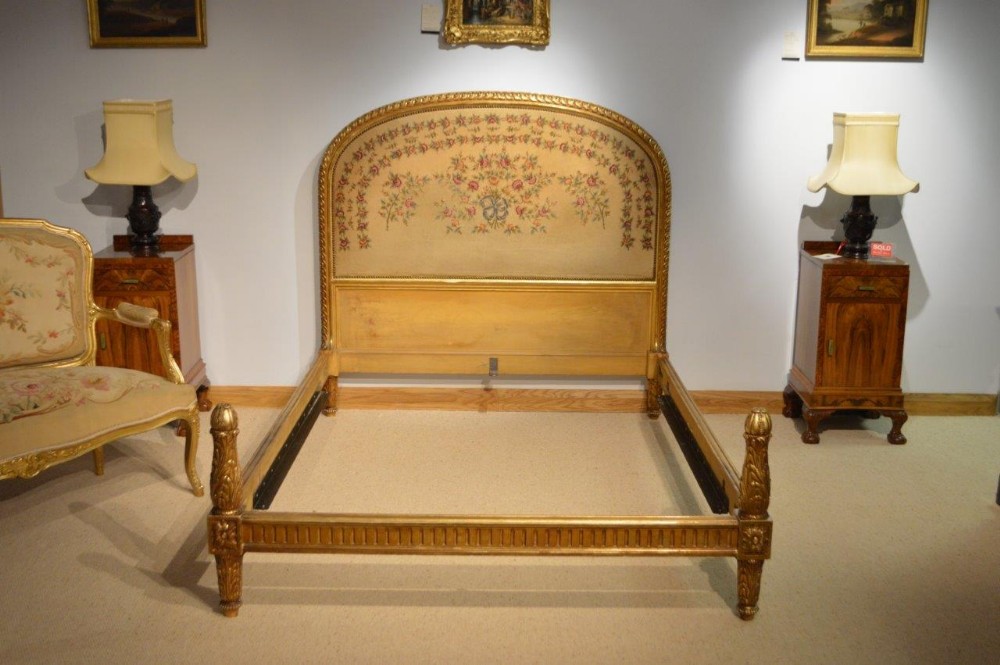 A Late 19th Century French Carved Gilt Wood Double Bed