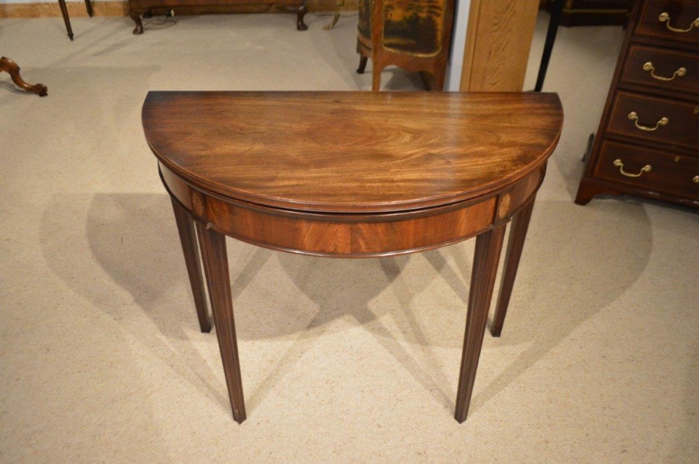 A Cuban Mahogany George III Period Antique Fold Over Games Table