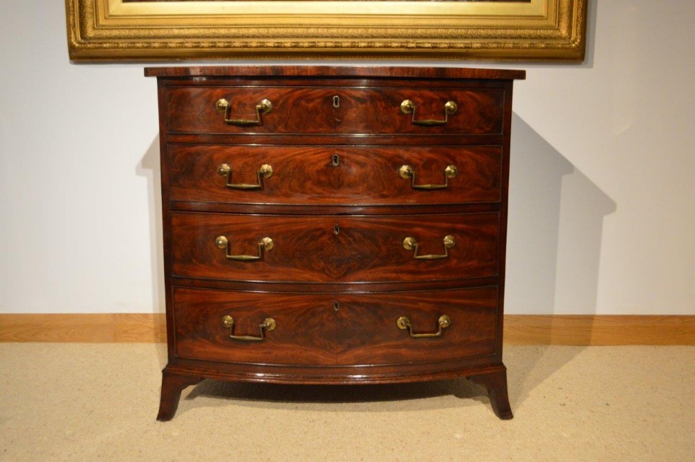 A Mahogany Regency Period Bow Front Chest Of Drawers