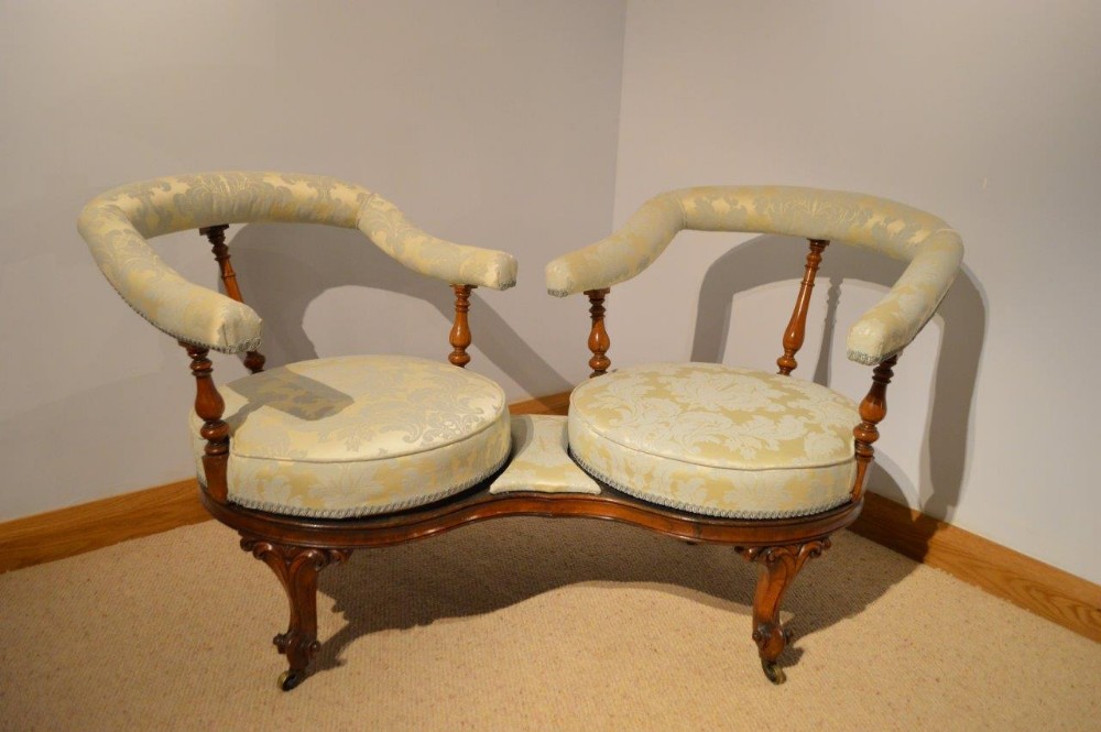 A Rare Walnut Victorian Period Love/Conversation Settee