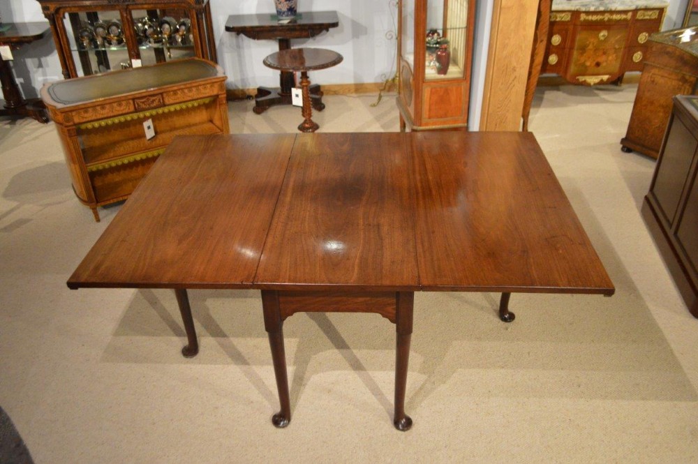 A Cuban Mahogany George III Period Pad Foot Six Leg Dining Table