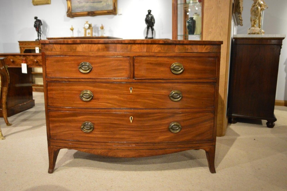 A Mahogany Regency Period Bow Front Chest Of Drawers