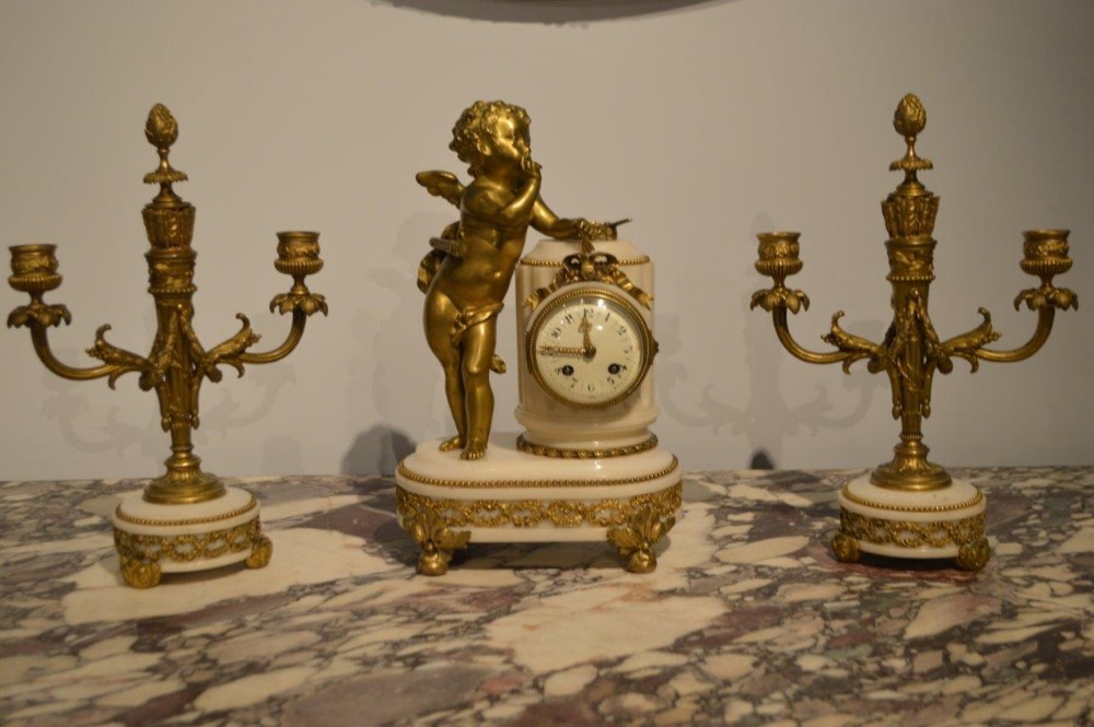 A Marble & Ormolu Mounted French Clock Garniture