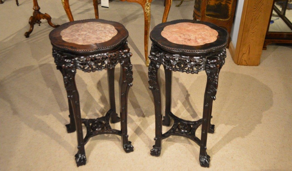 A Large Pair Of Hardwood & Marble Inset Chinese Stands 