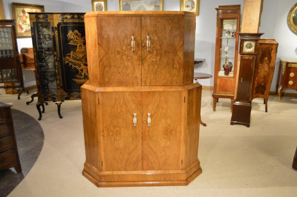 A hexagonal Art Deco Period Walnut Cocktail Cabinet.