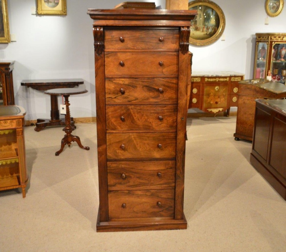 A Rosewood Early Victorian Period secretaire wellington chest