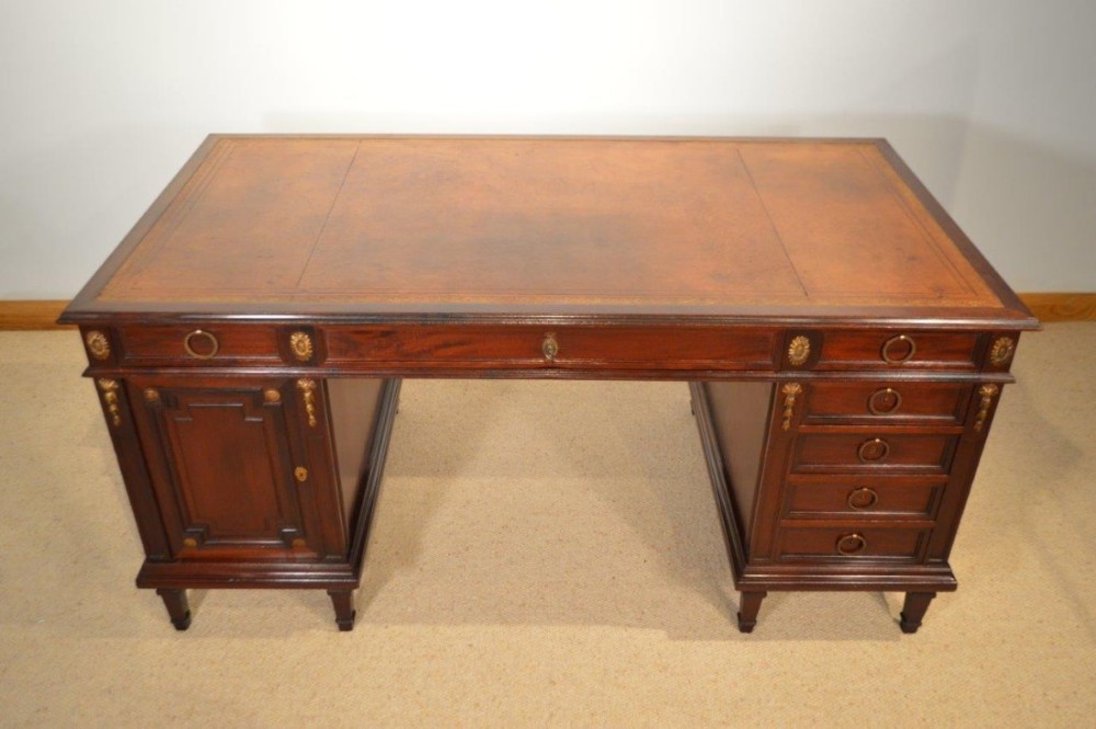 A superb quality mahogany French antique partners desk.