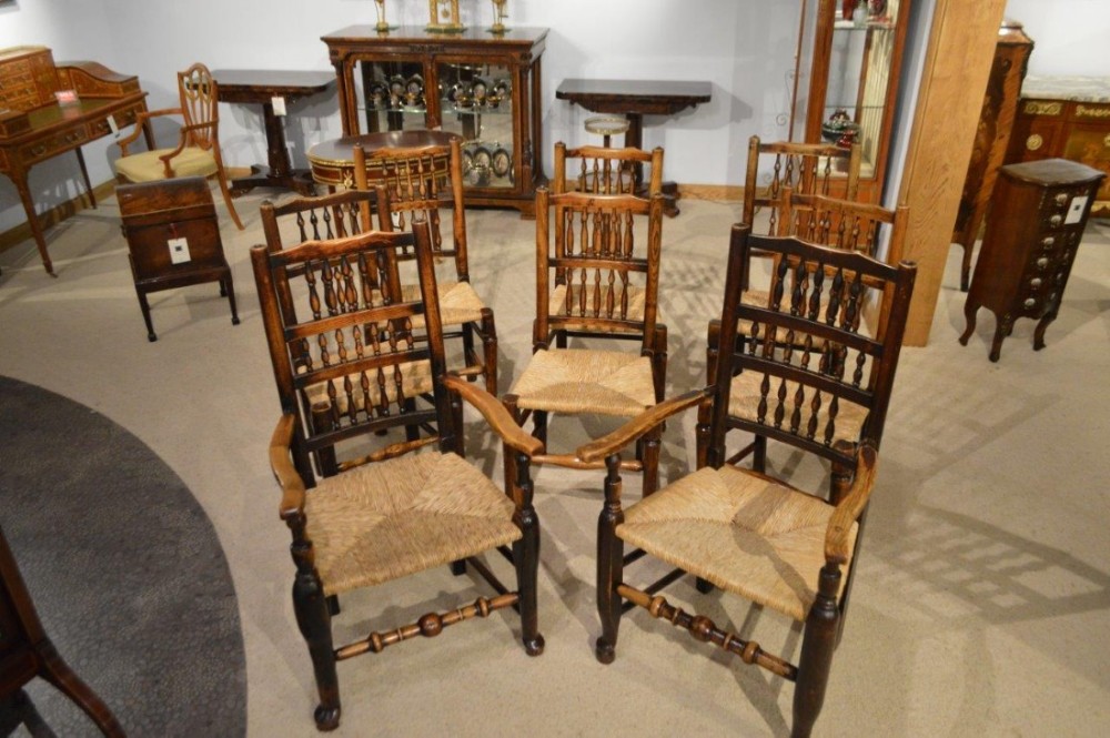 A Harlequin set of 8  Lancashire ash and elm spindle-back chairs