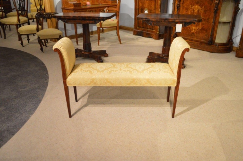 A mahogany inlaid Edwardian Period window seat/duet stool