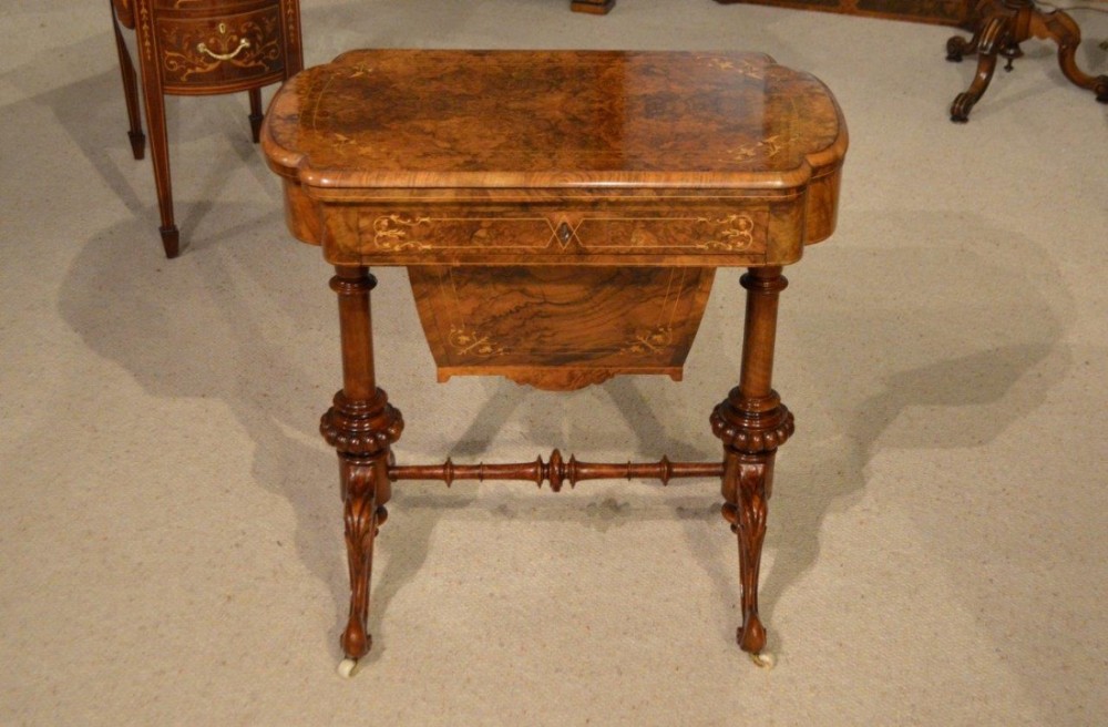 A fine quality burr walnut & marquetry inlaid Victorian Period games table
