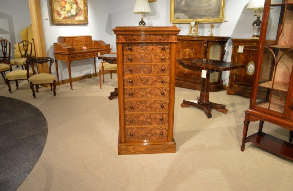 A  burr Walnut Victorian Period antique wellington chest made by A.J. Gilham