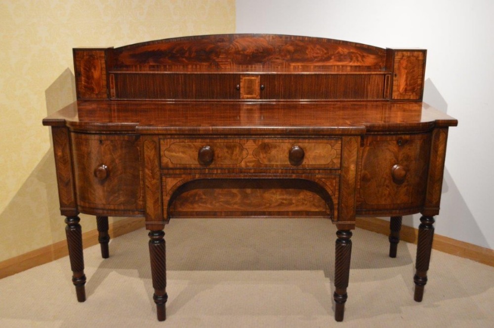 A beautiful mahogany & brass inlaid Regency Period serving sideboard.