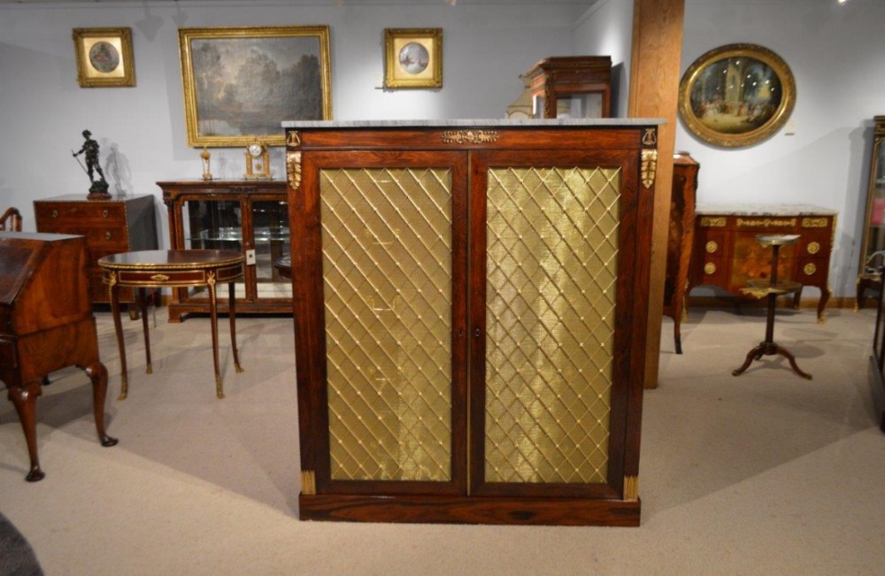 A rosewood and ormolu mounted Regency Period library cabinet. 