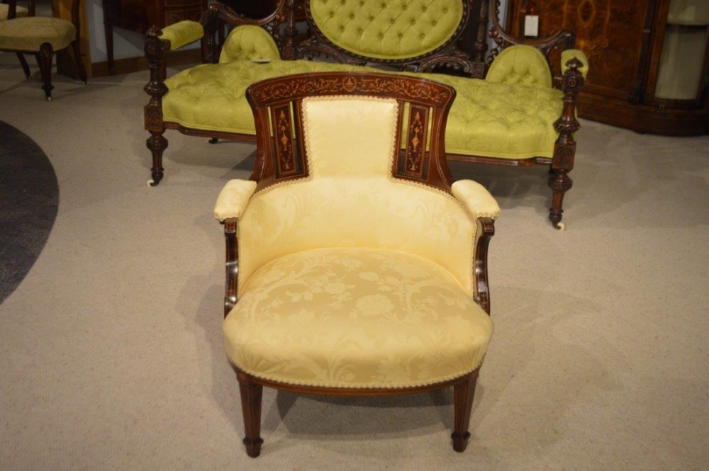 A mahogany & marquetry inlaid Edwardian Period antique tub chair