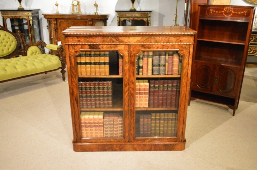  A figured walnut Victorian Period two door bookcase