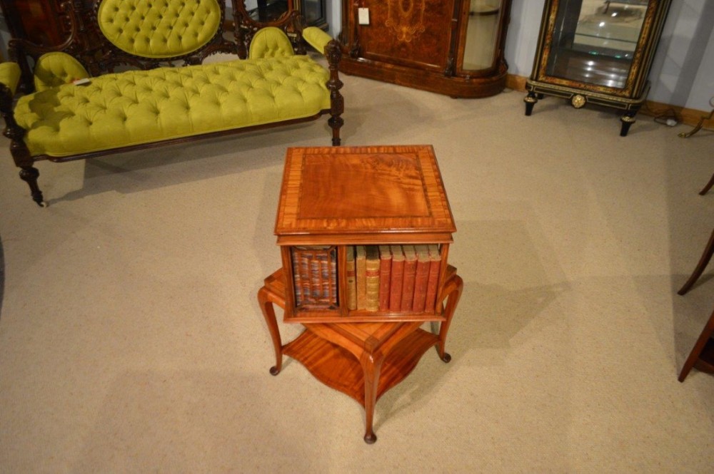 A satinwood Edwardian Period revolving bookcase by James Shoolbred