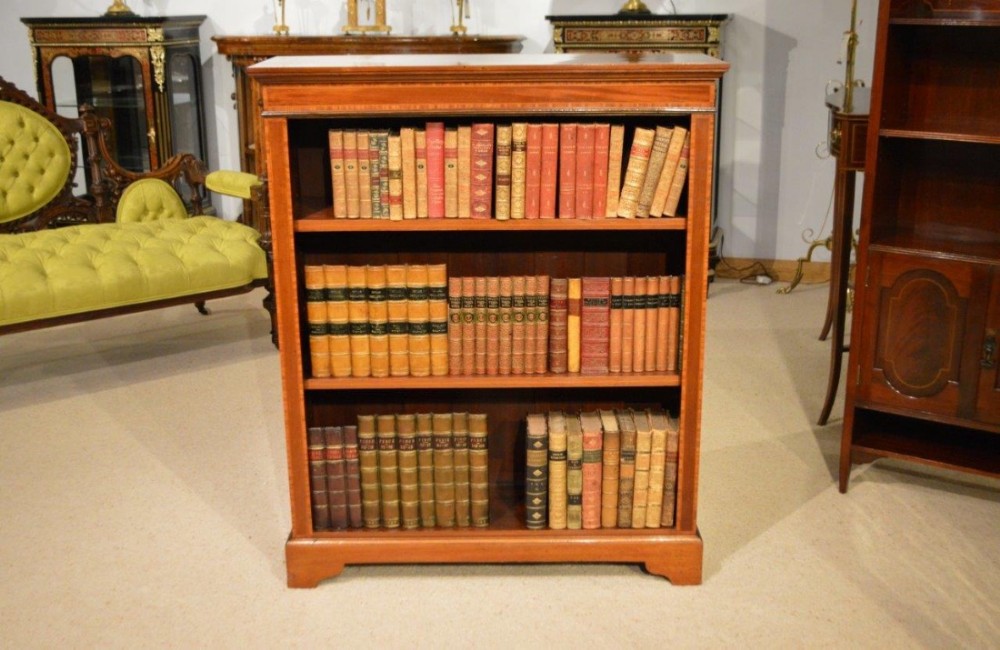 A mahogany and satinwood inlaid Edwardian Period antique open bookcase