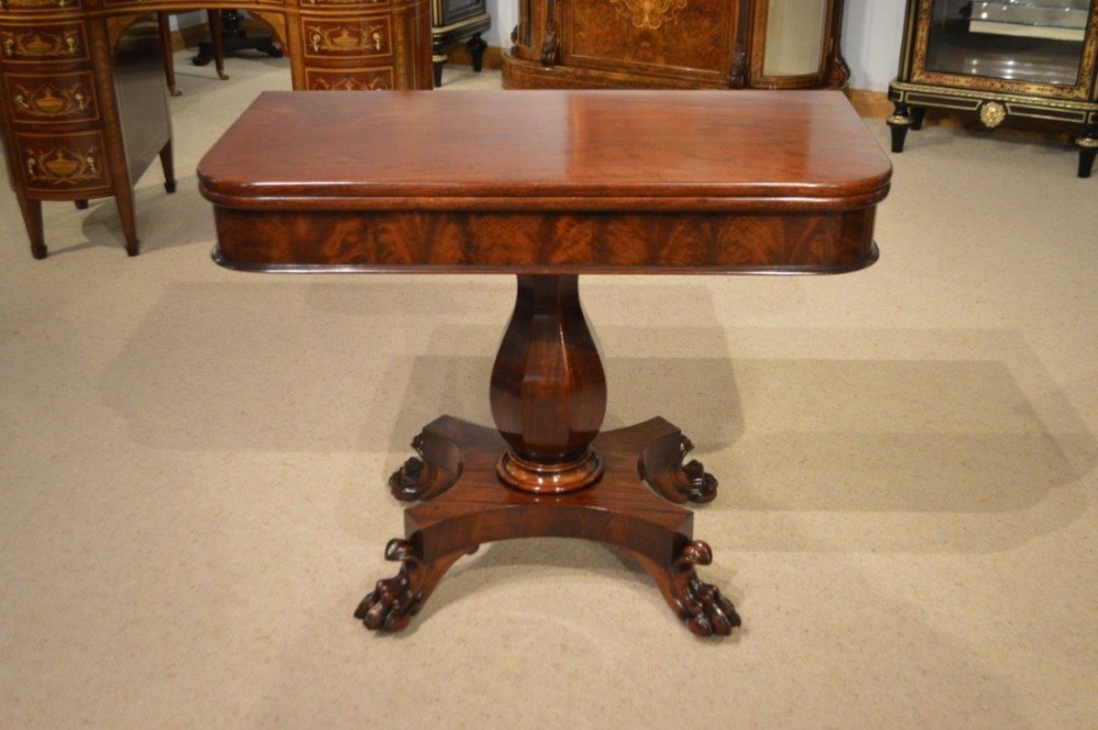 A mahogany William IV Period Turnover Tea Table.