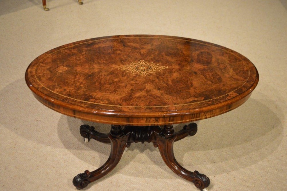 A superb quality burr walnut Victorian Period oval antique coffee table