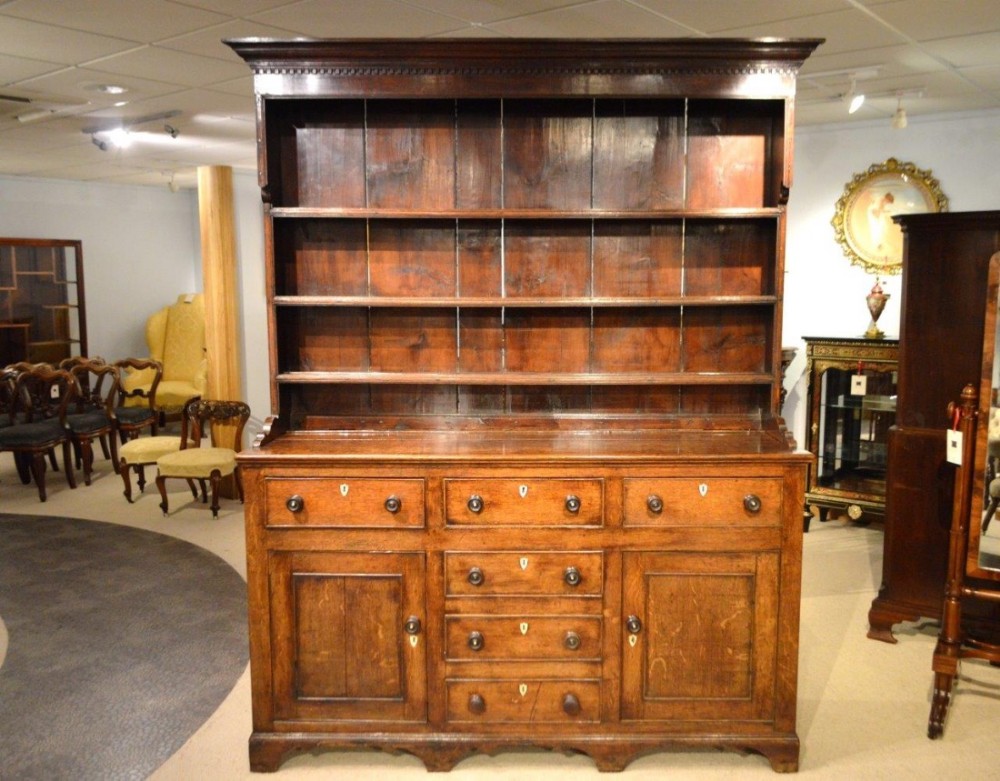 An oak Early 19th Century Welsh Dresser & Rack