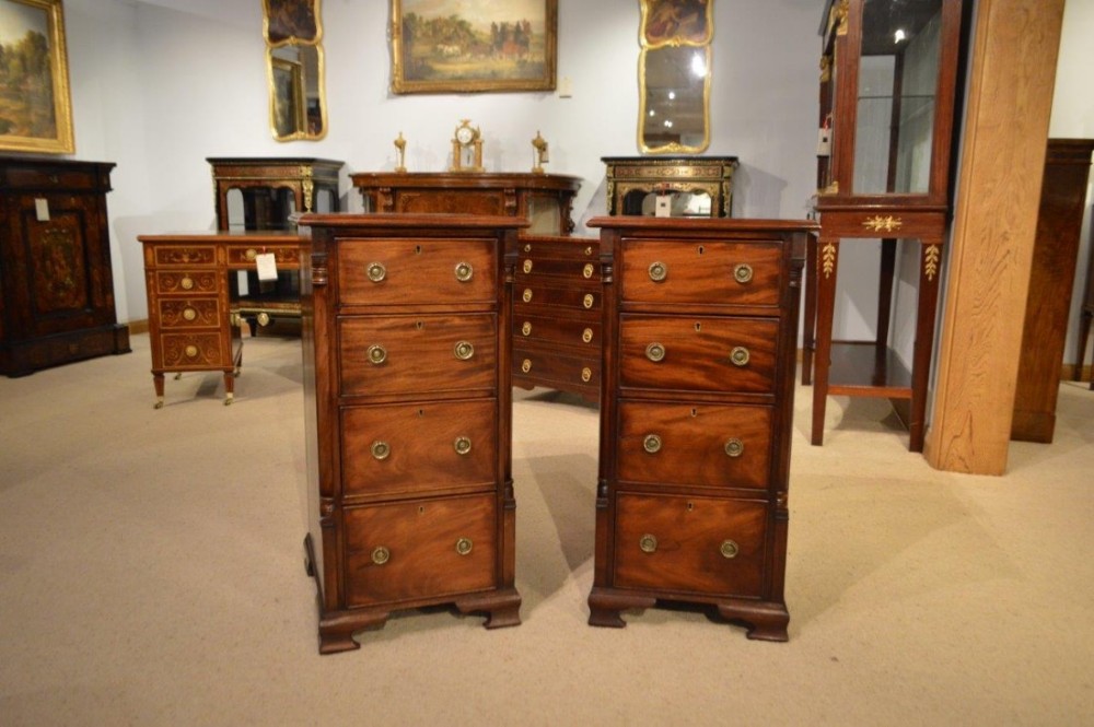 A pair of mahogany 19th Century antique bedside chests