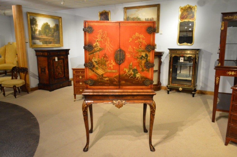 A fine quality chinoiserie and red lacquer antique cocktail cabinet.