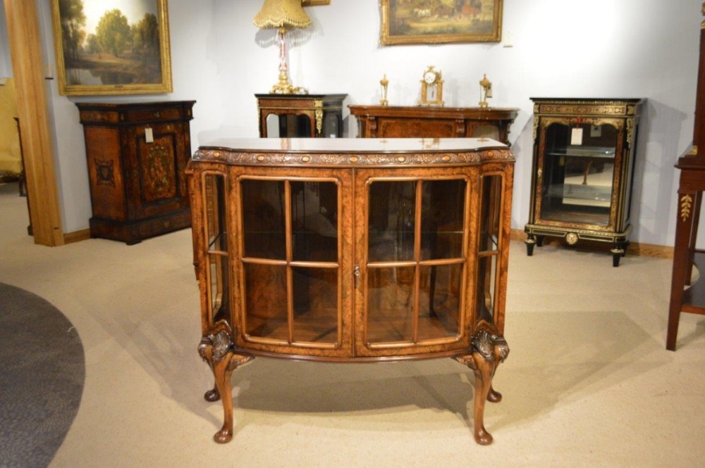 A beautiful walnut Edwardian Period George I Style serpentine display cabinet