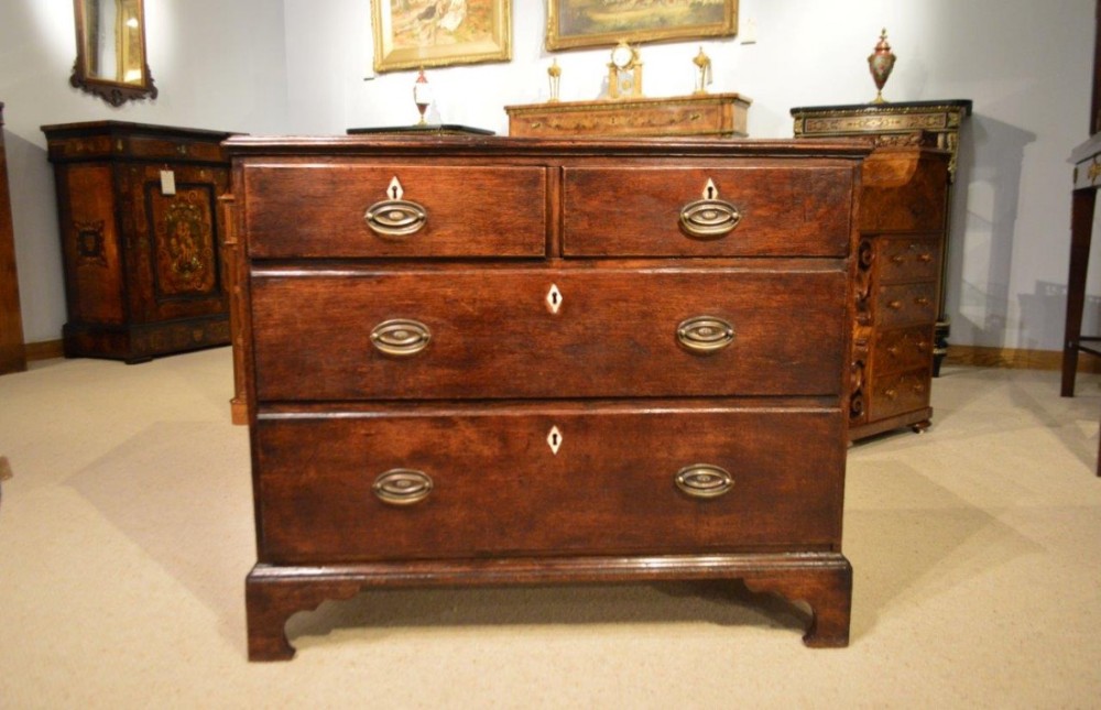 A small oak George III Period antique chest of drawers.
