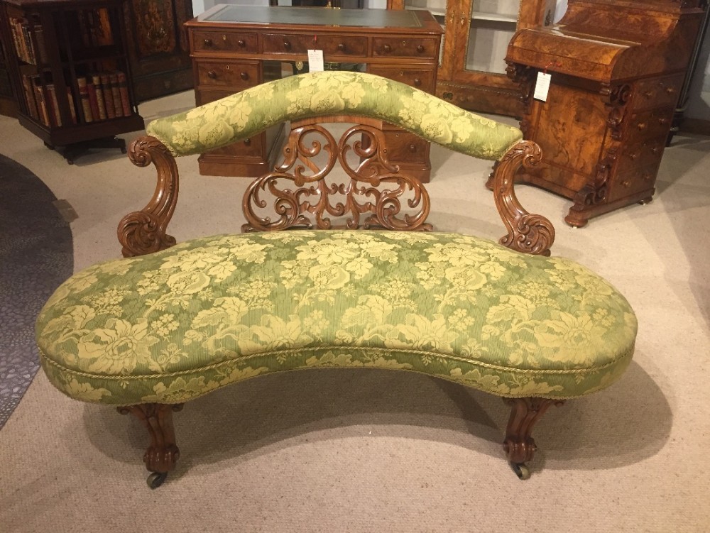 A Beautiful quality carved walnut Victorian Period boudoir sofa.