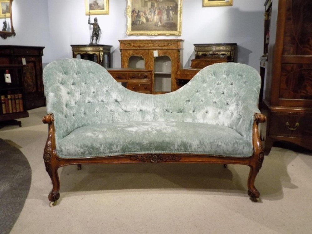 A walnut Victorian Period antique chaise longue