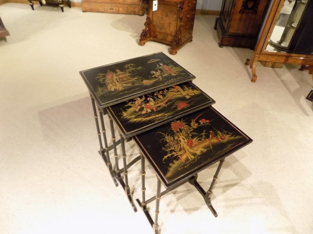 A Chinoiserie Lacquered Edwardian Period  Nest Of Three Tables.
