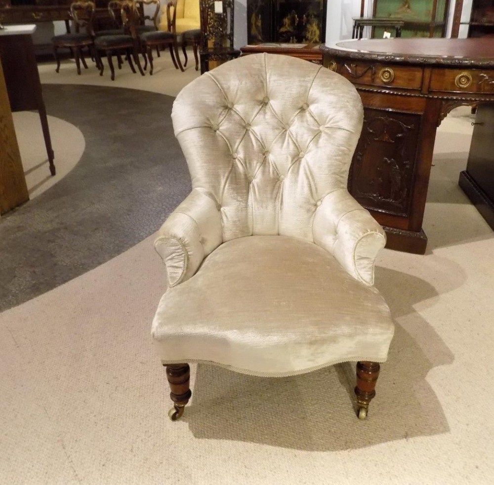 A Victorian Period Deep buttoned nursing chair by Gillows Of Lancaster.