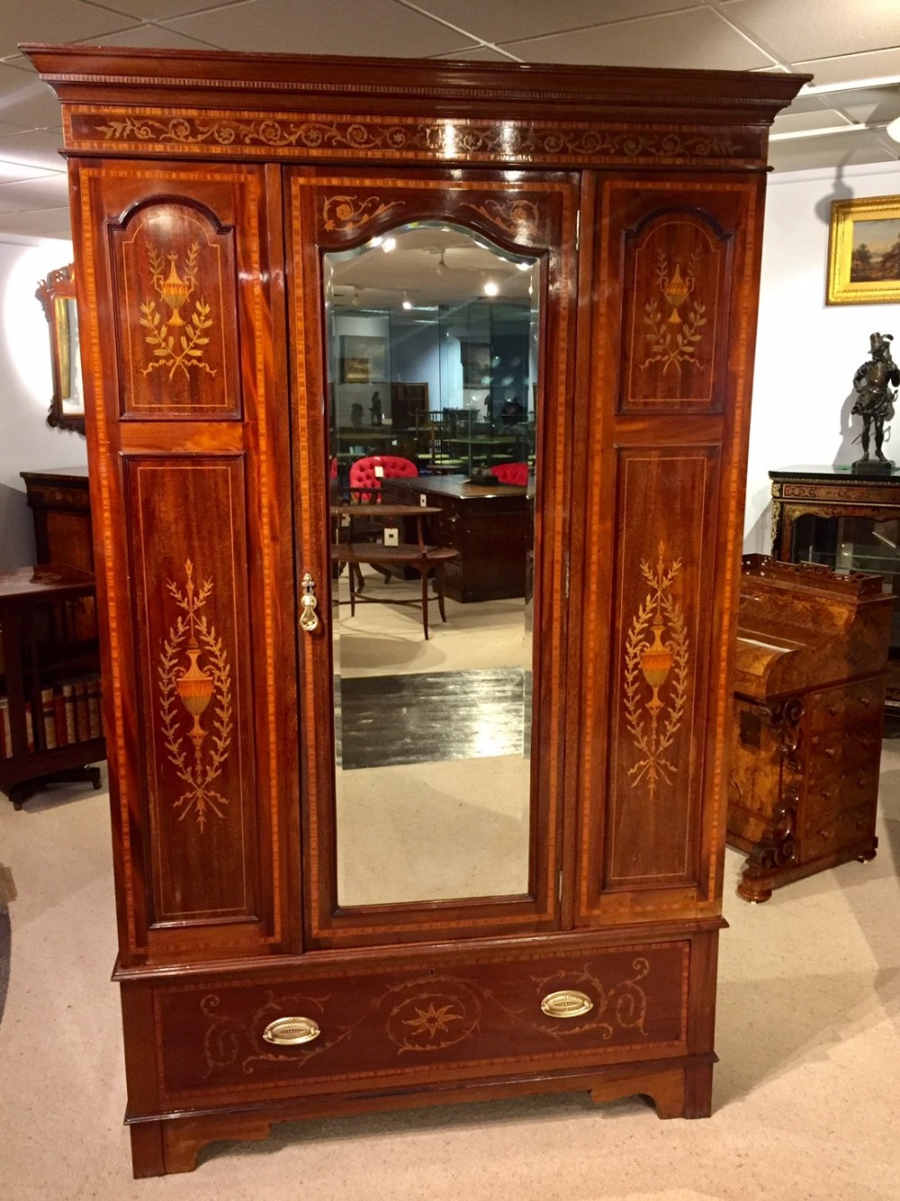A marquetry inlaid Edwardian Period antique wardrobe