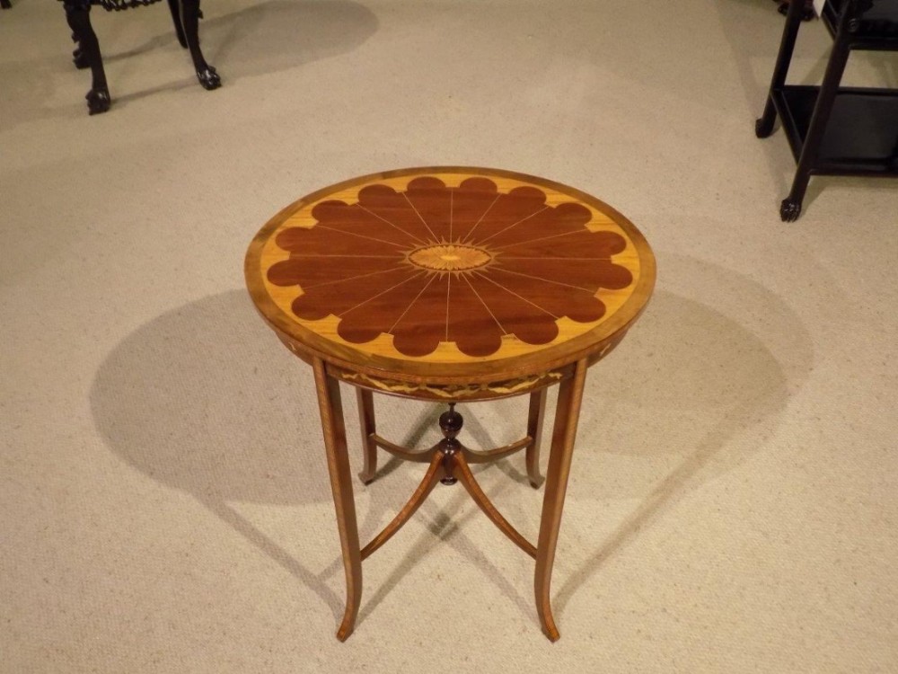 A beautiful mahogany, satinwood & marquetry inlaid Edwardian Period oval occasional table.