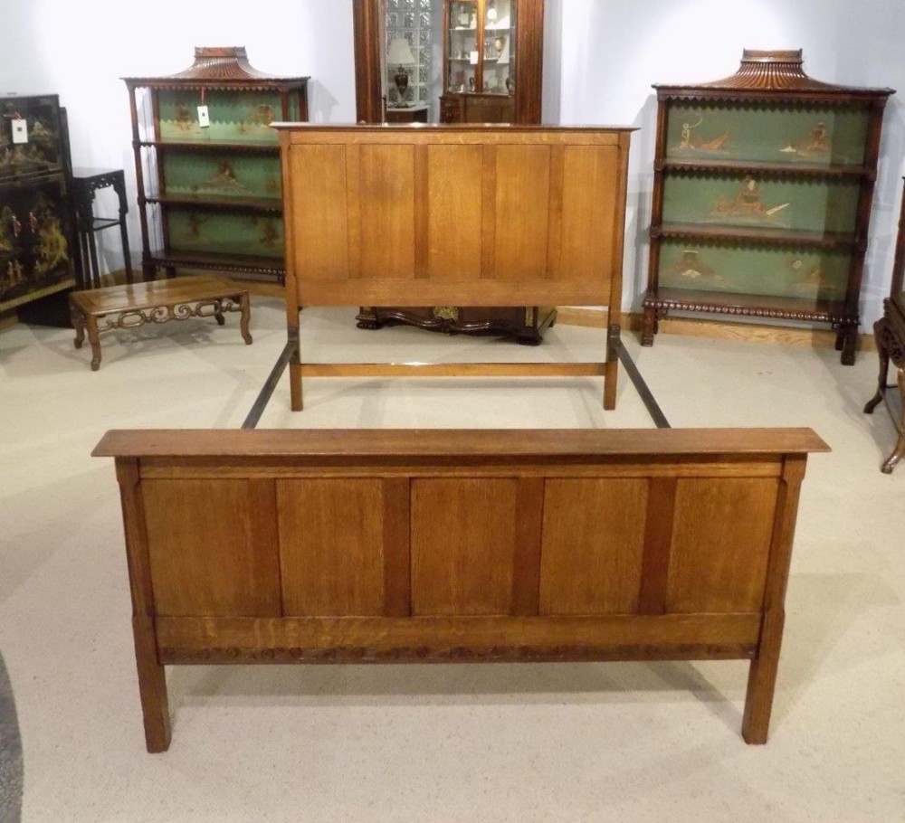 A rare oak Arts & Crafts Period double bed by Arthur Simpson of Kendal.