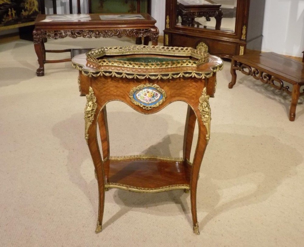 A French 19th Century Kingwood Jardiniere With Sevres Plaques signed Vervelle Audot