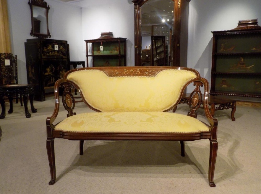 A fine quality mahogany, rosewood & marquetry inlaid Edwardian Period sofa.