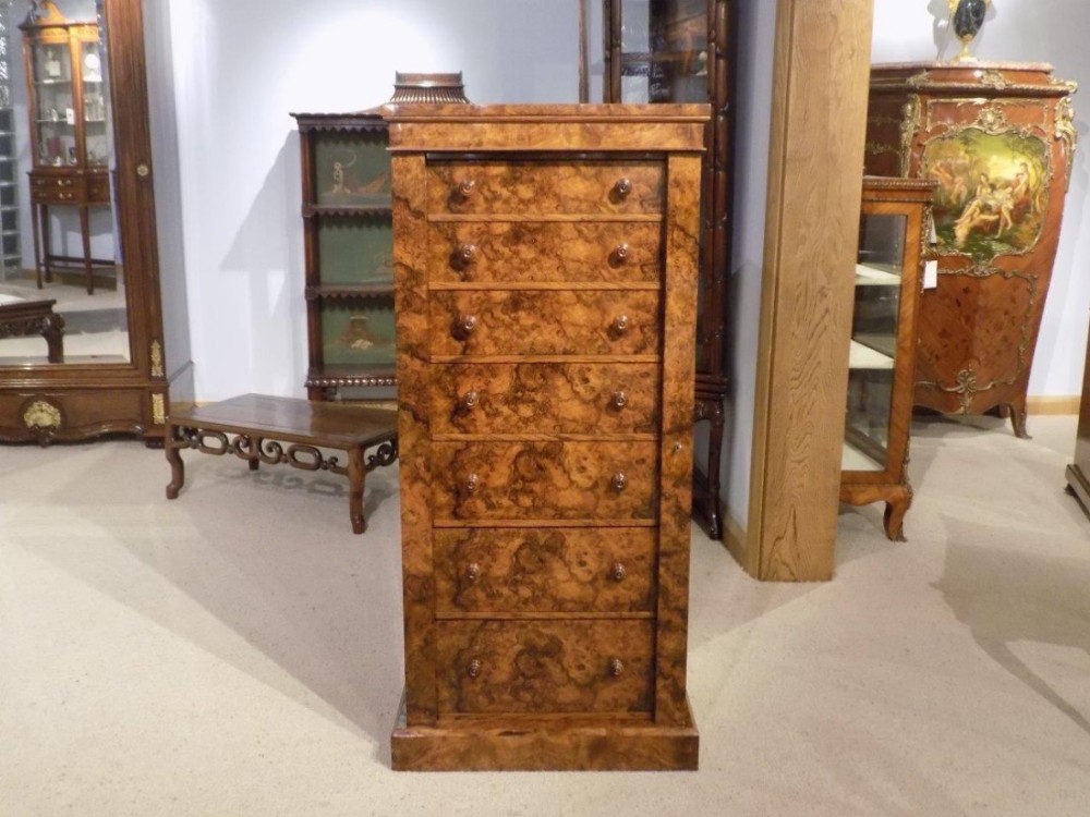 A burr walnut Victorian Period antique Wellington chest