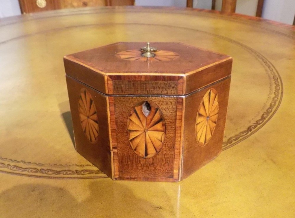 A mahogany George III Period hexagonal tea caddy