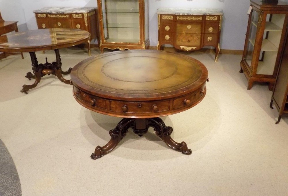 A stunning quality flamed mahogany Early Victorian drum table