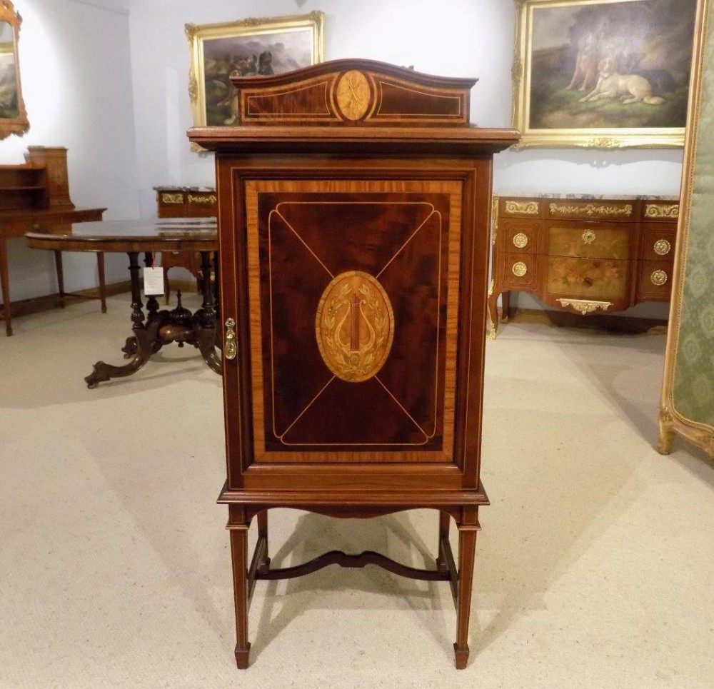 A Fine Mahogany & Satinwood marquetry inlaid Edwardian Period music cabinet by Shapland & Petter